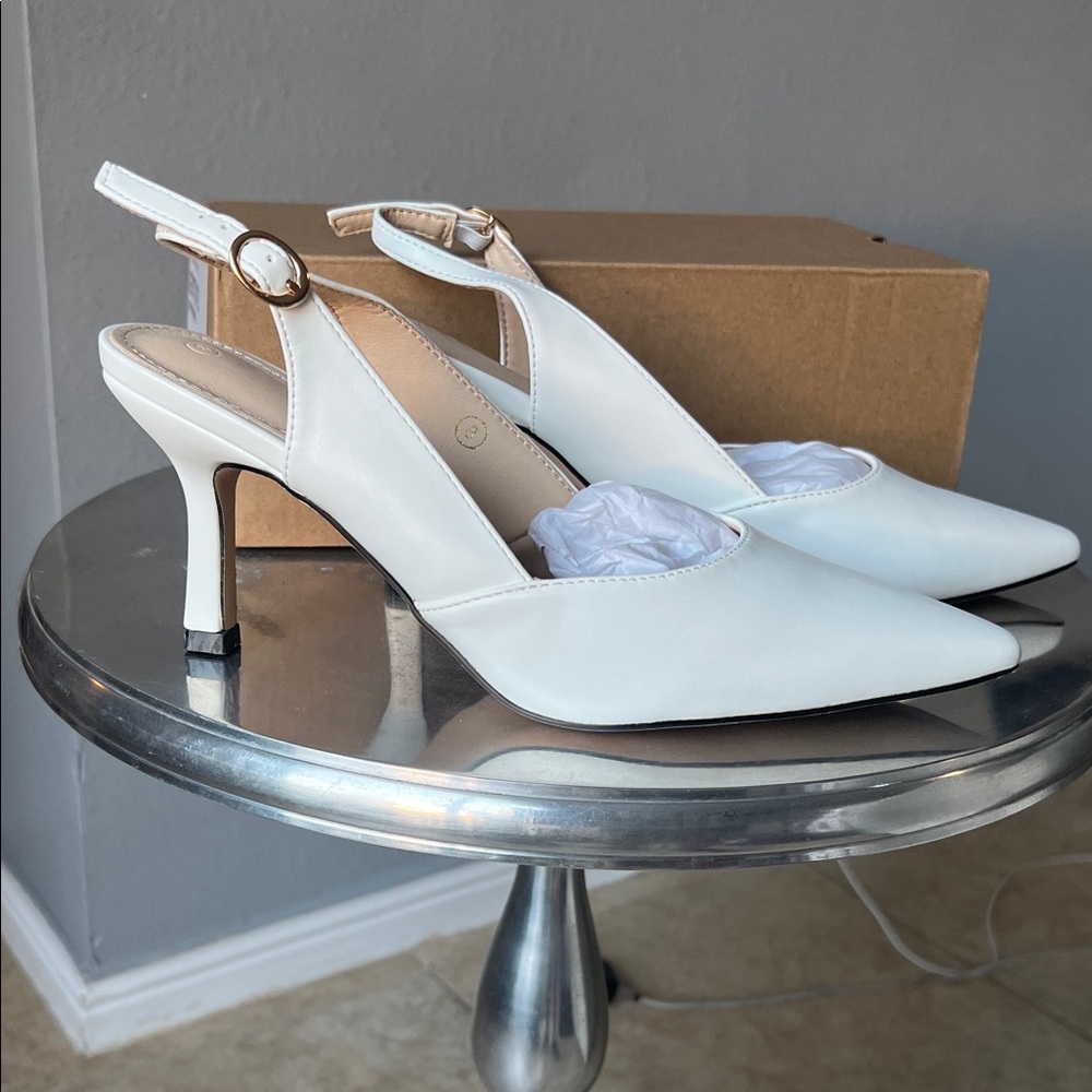 White pointed heels
